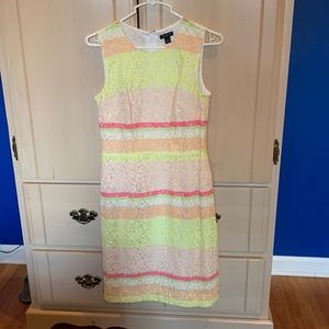 Lace sleeveless dress.  Back zipper. Beautiful colors for Easter and spring